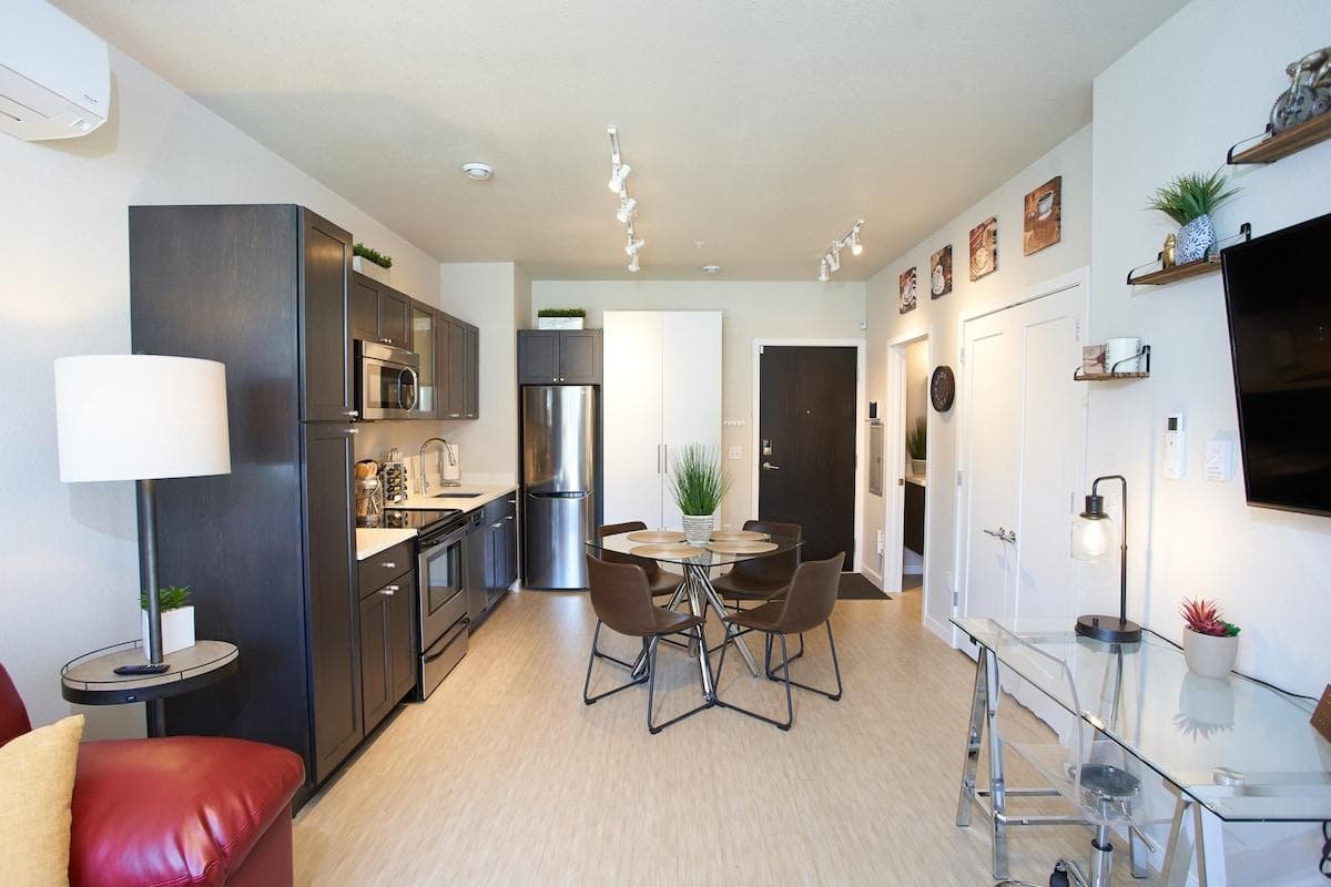 Dining area, kitchen,  and closets 