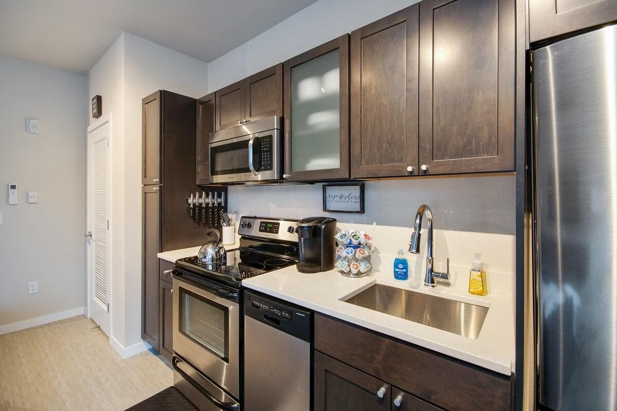 Fully stocked kitchen with dishwasher