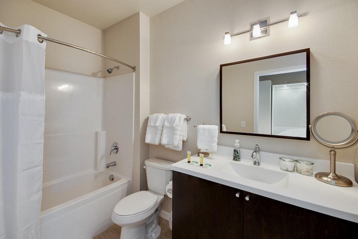 Full bathroom with floating vanity
